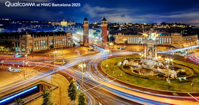 a long exposure shot of plaza espanya at night with traffic